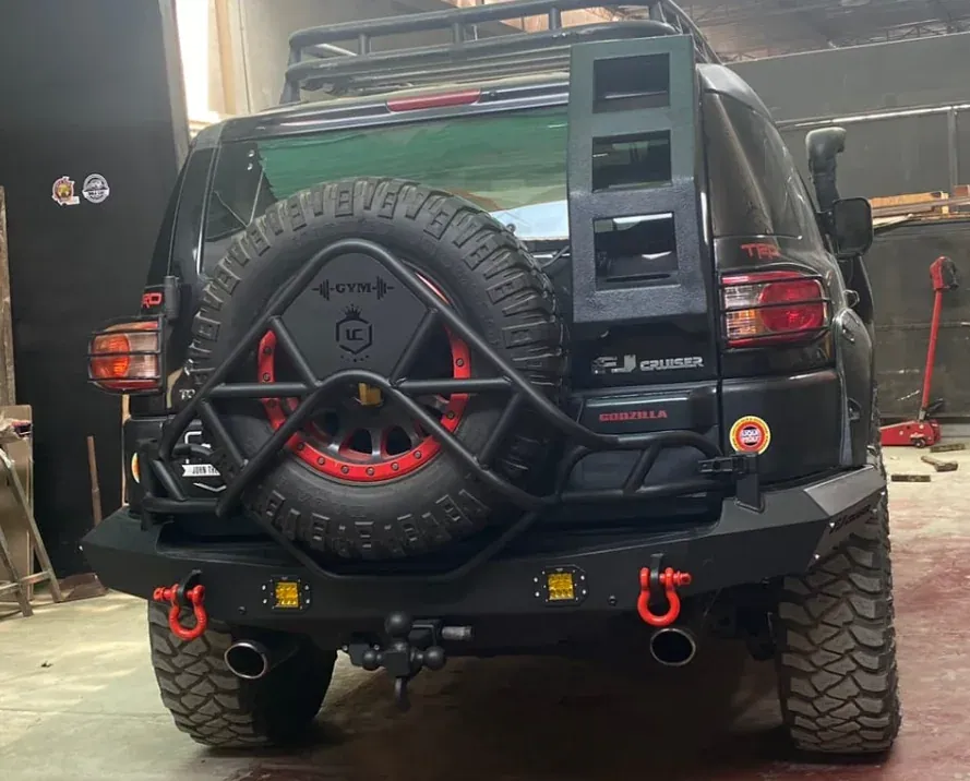 Rear view of a Toyota FJ with a bumper and spare wheel carrier